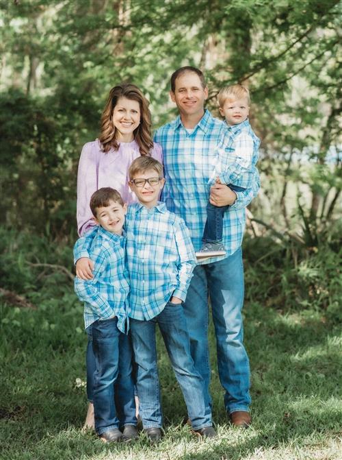 Family photo of Mike DeWitt, wife, three boys